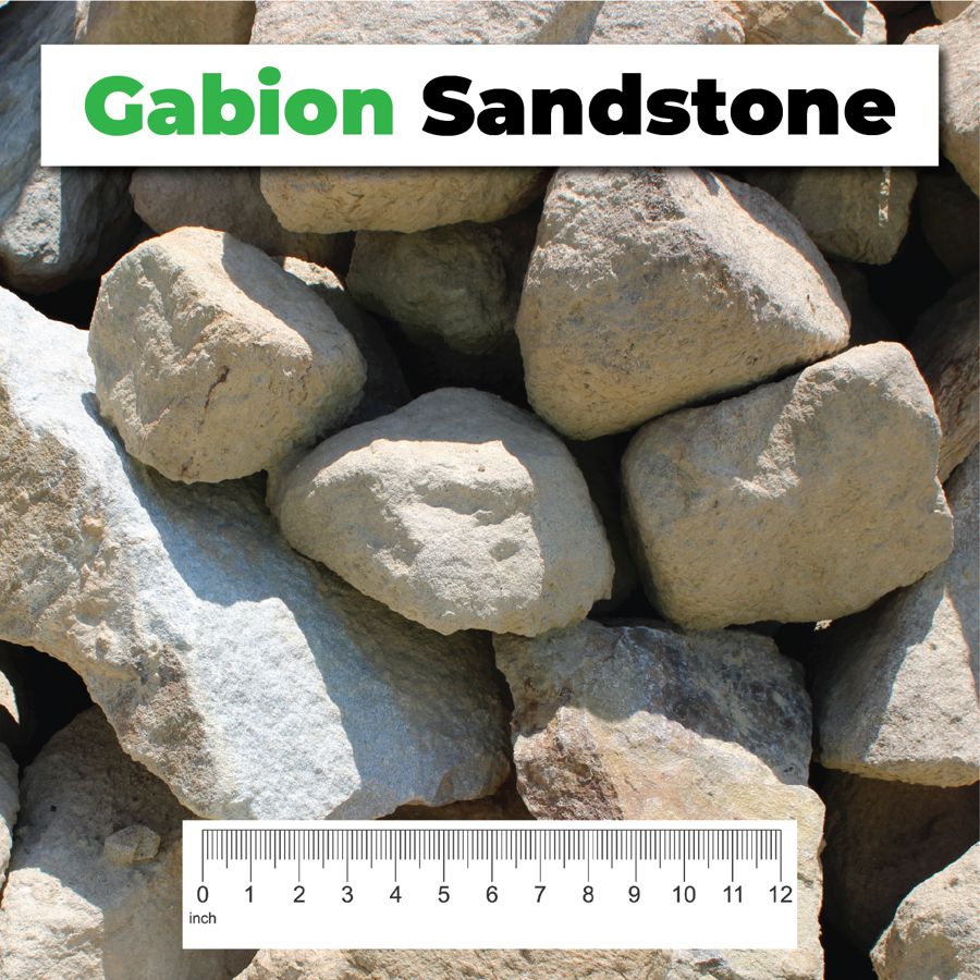 Gabion Sandstone 6–12″ crushed aggregate shown with a ruler for scale – Kimble Company, Dover OH