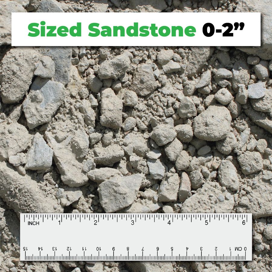 Granular Sandstone Fill 0–2″ crushed aggregate shown with a ruler for scale – Kimble Company, Dover OH