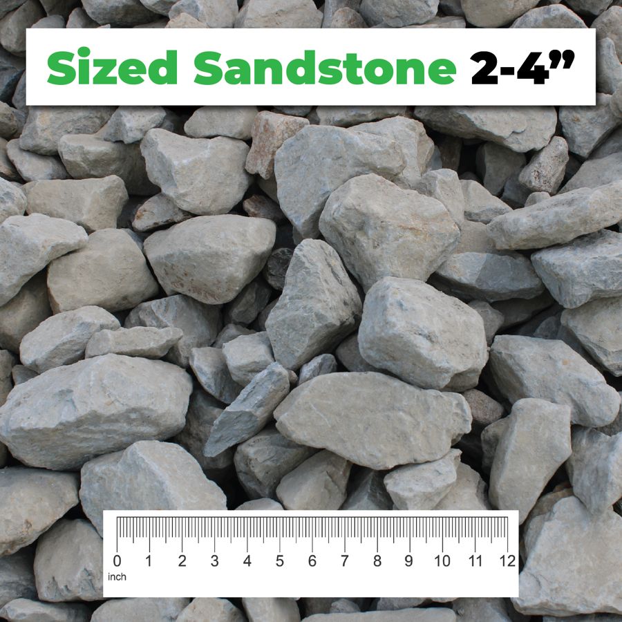 Sized Sandstone 2–4″ crushed aggregate shown with a ruler for scale – Kimble Company, Dover OH