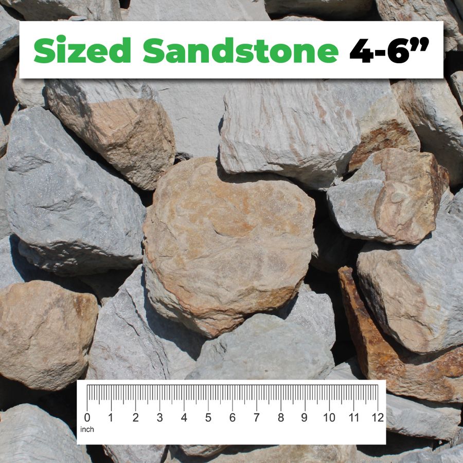 Sized Sandstone 4–6″ crushed aggregate shown with a ruler for scale – Kimble Company, Dover OH