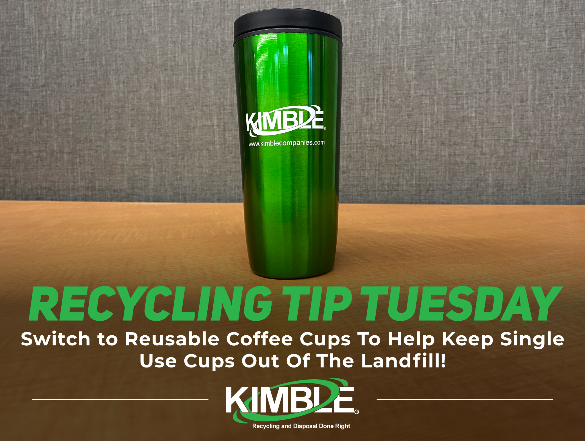 Kimble's green reusable coffee cup on a wooden surface promotes reducing landfill waste as part of a sustainability effort.